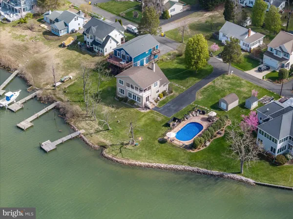 a swimming pool with outdoor seating yard and outdoor seating