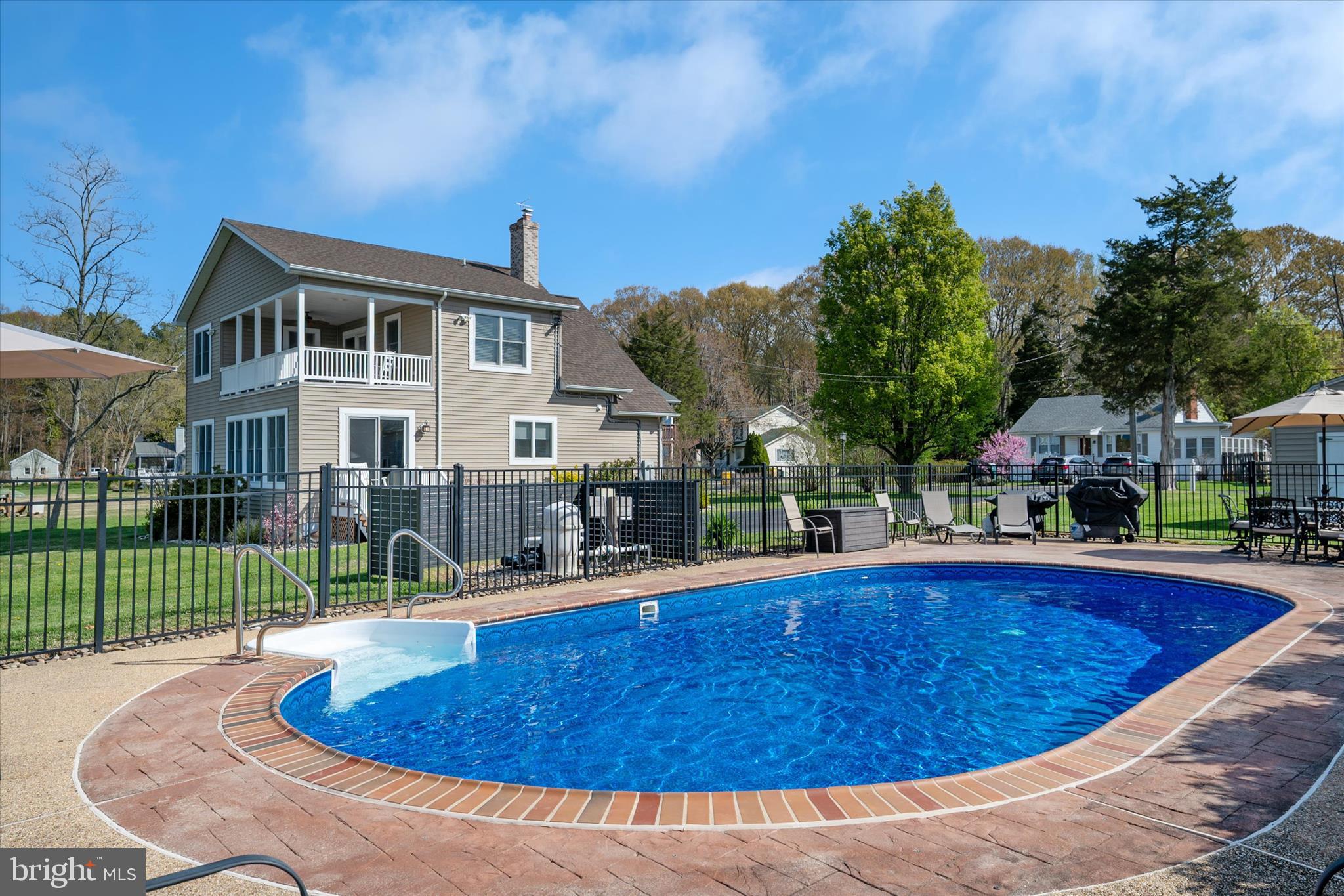 5936 Sneed Drive Deale, MD 20751 - Photo 4 of 59 a swimming pool with outdoor seating yard and outdoor seating