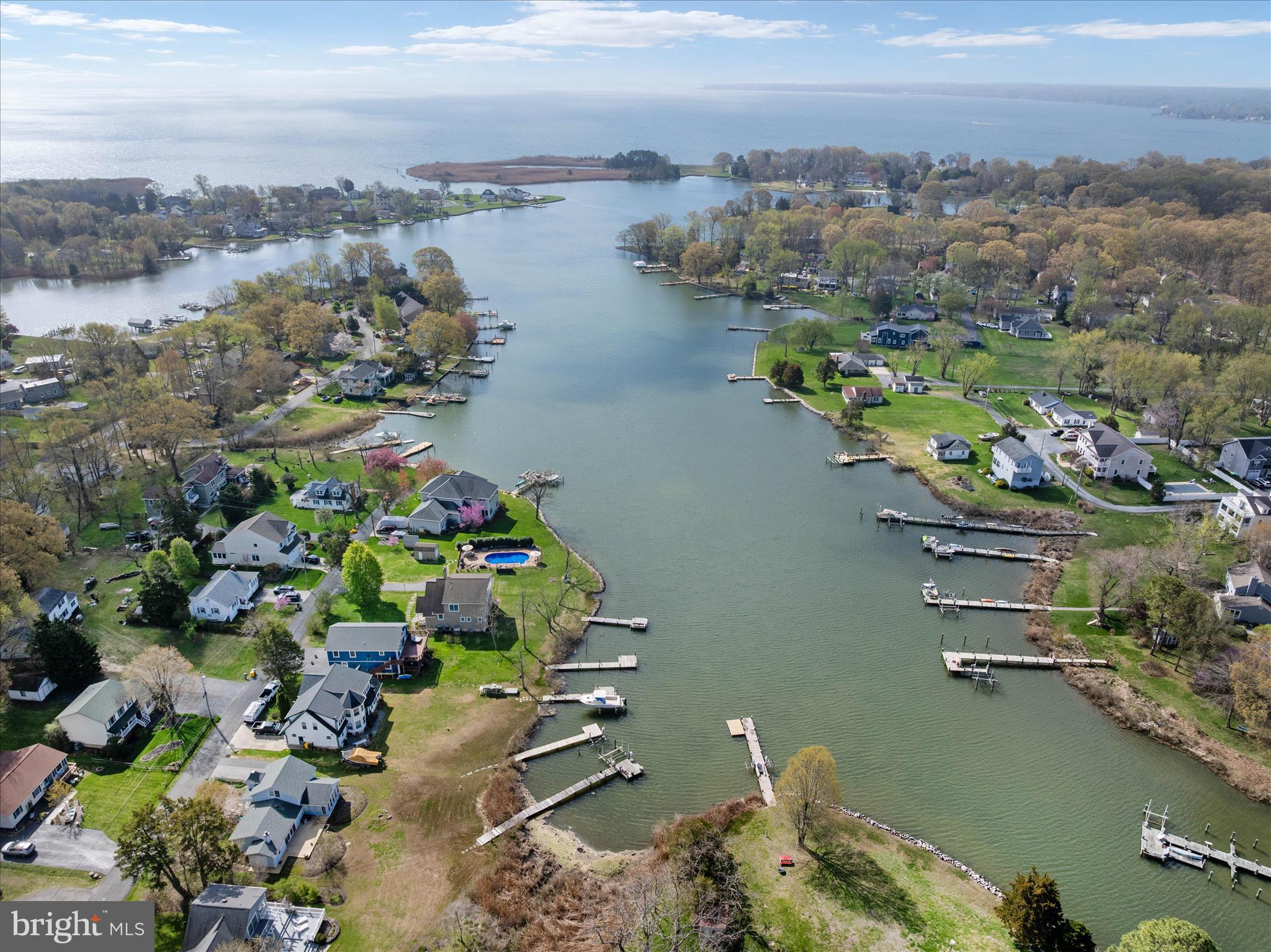 5936 Sneed Drive Deale, MD 20751 - Photo 49 of 59 a view of a lake with a mountain in the background