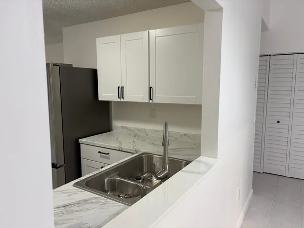 a utility room with washer and dryer