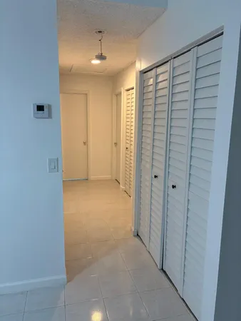 a view of hallway with shower