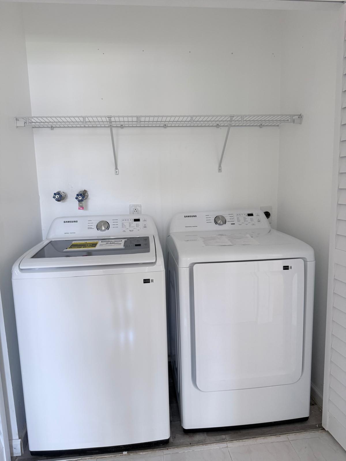 12231 Southwest 210th Street Miami, FL 33177 - Photo 16 of 38 a utility room with dryer and washer