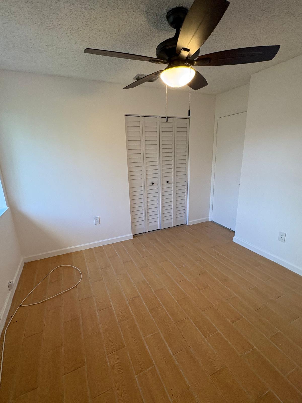 12231 Southwest 210th Street Miami, FL 33177 - Photo 23 of 38 a view of an empty room