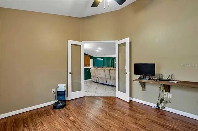 a view of a livingroom with a flat screen tv
