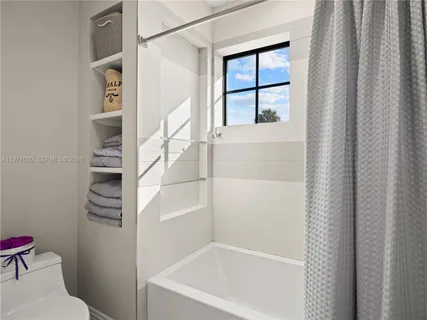 a view of a hallway with entryway