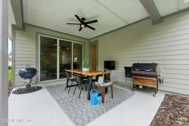 a view of houses with outdoor space and swimming pool