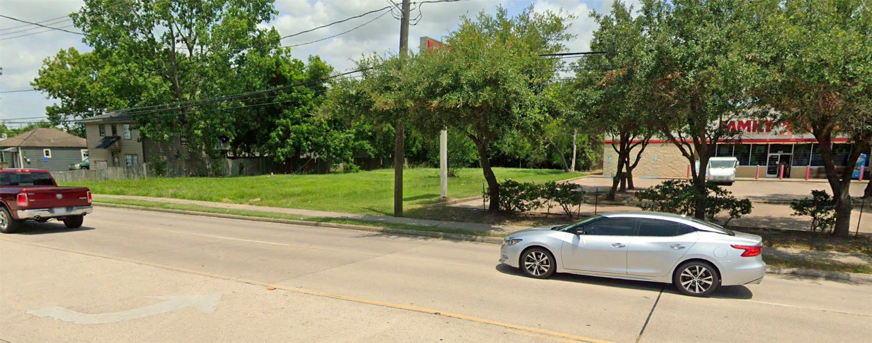 Tbd Massey Tompkins Road Baytown, TX 77521 - Photo 2 of 4 a car parked in front of a house