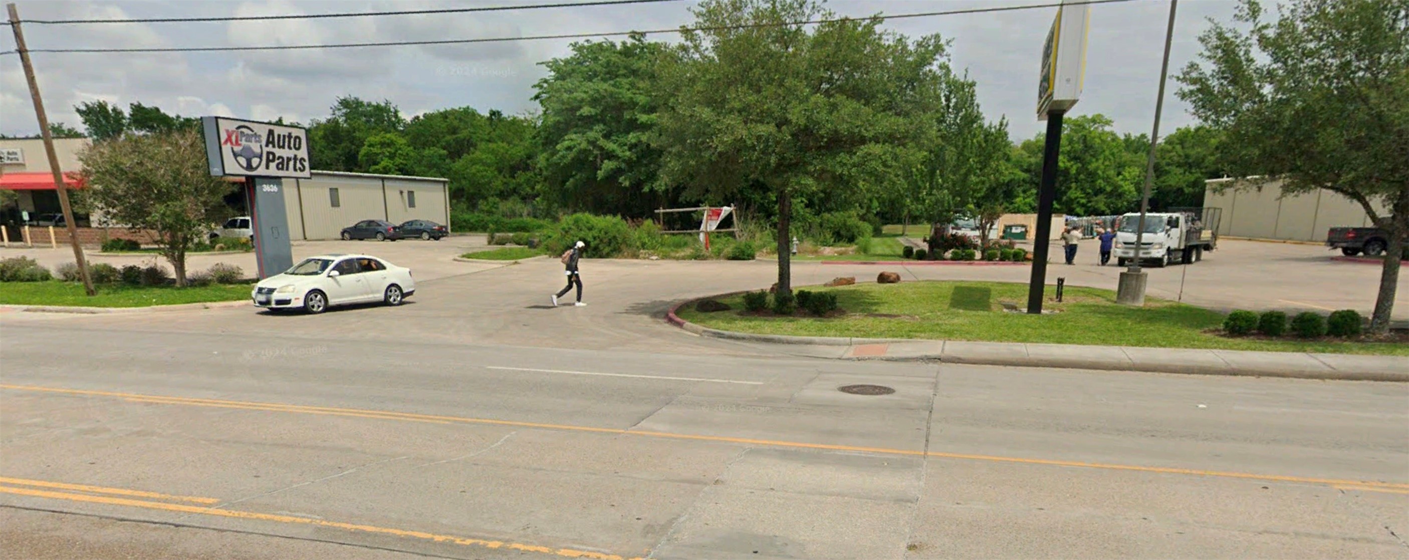Tbd Massey Tompkins Road Baytown, TX 77521 - Photo 3 of 4 a car parked on the side of the road