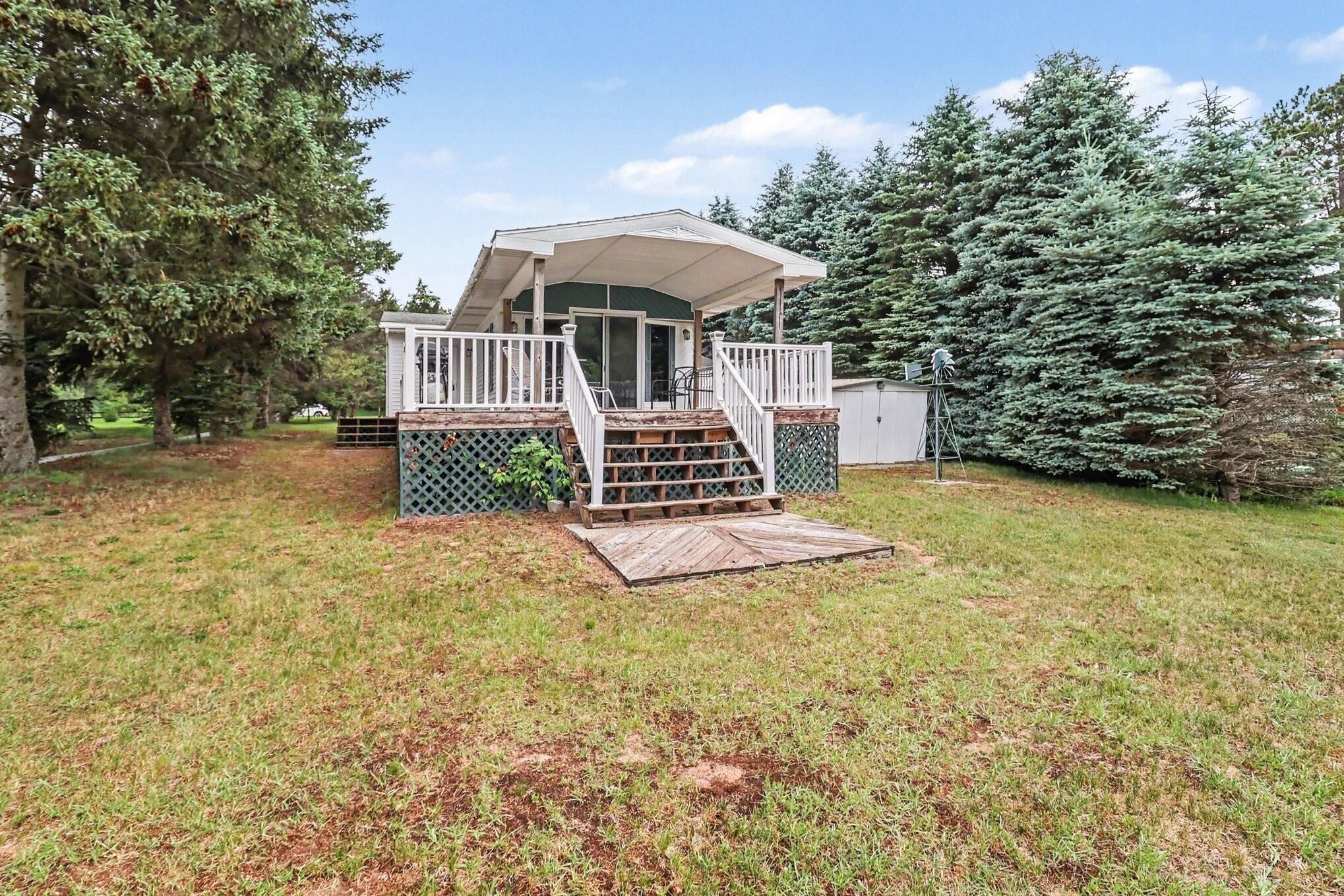 7951 West Village Road Mears, MI 49436 - Photo 1 of 13 Lakeside Deck