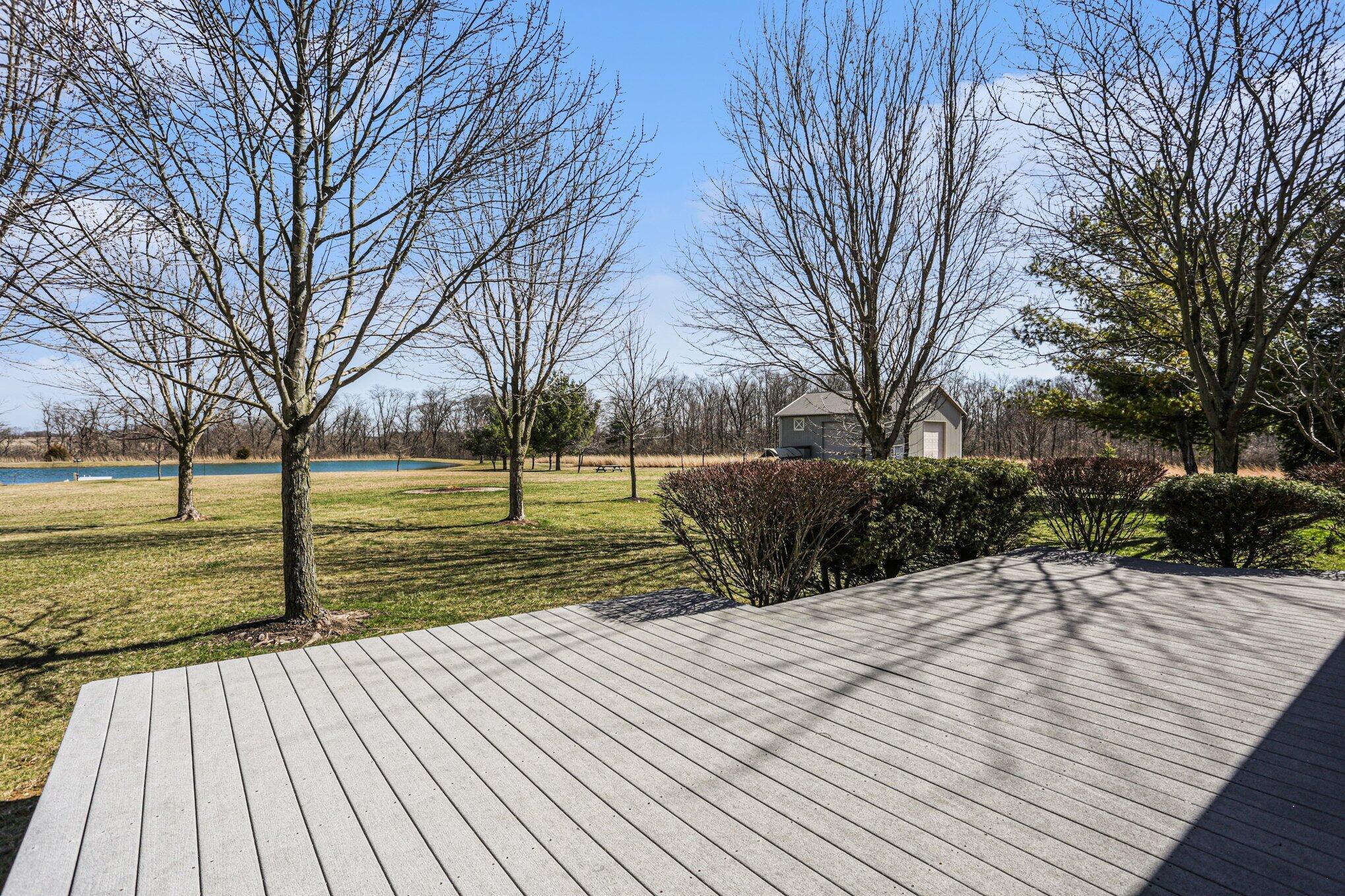1855 Spring Valley Road London, OH 43140 - Photo 35 of 54 Trex deck overlooking the pond. Multiple fruit bearing trees!