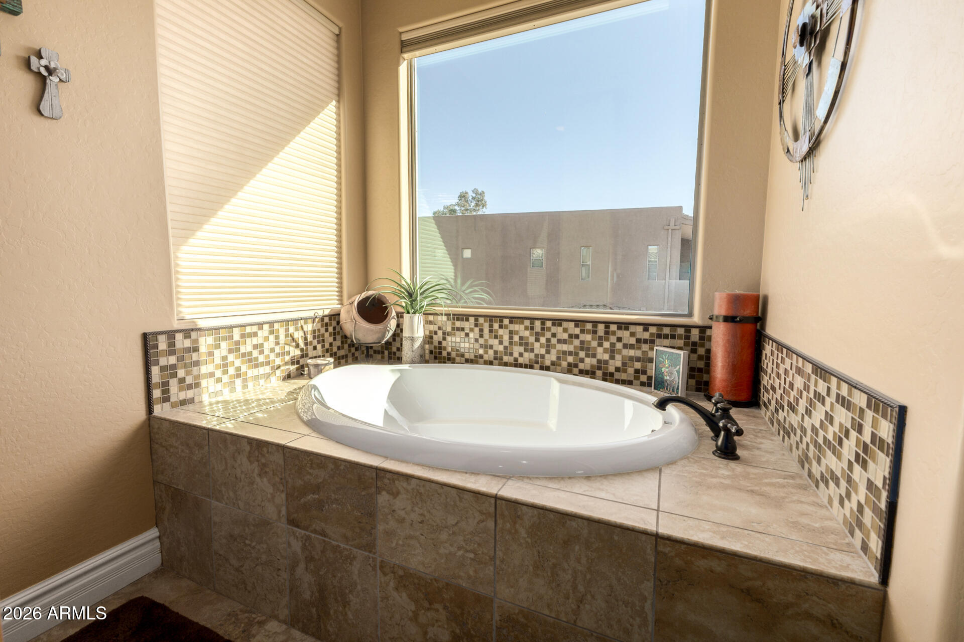 6434 East Military Road, Unit 102 Cave Creek, AZ 85331 - Photo 20 of 66 a bathroom with a bathtub and a window