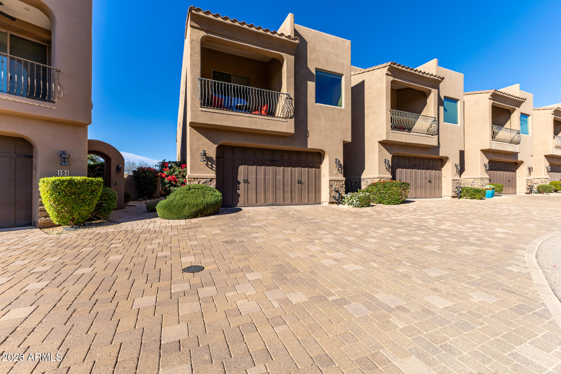 6434 East Military Road, Unit 102 Cave Creek, AZ 85331 - Photo 2 of 66 a view of a house with a yard