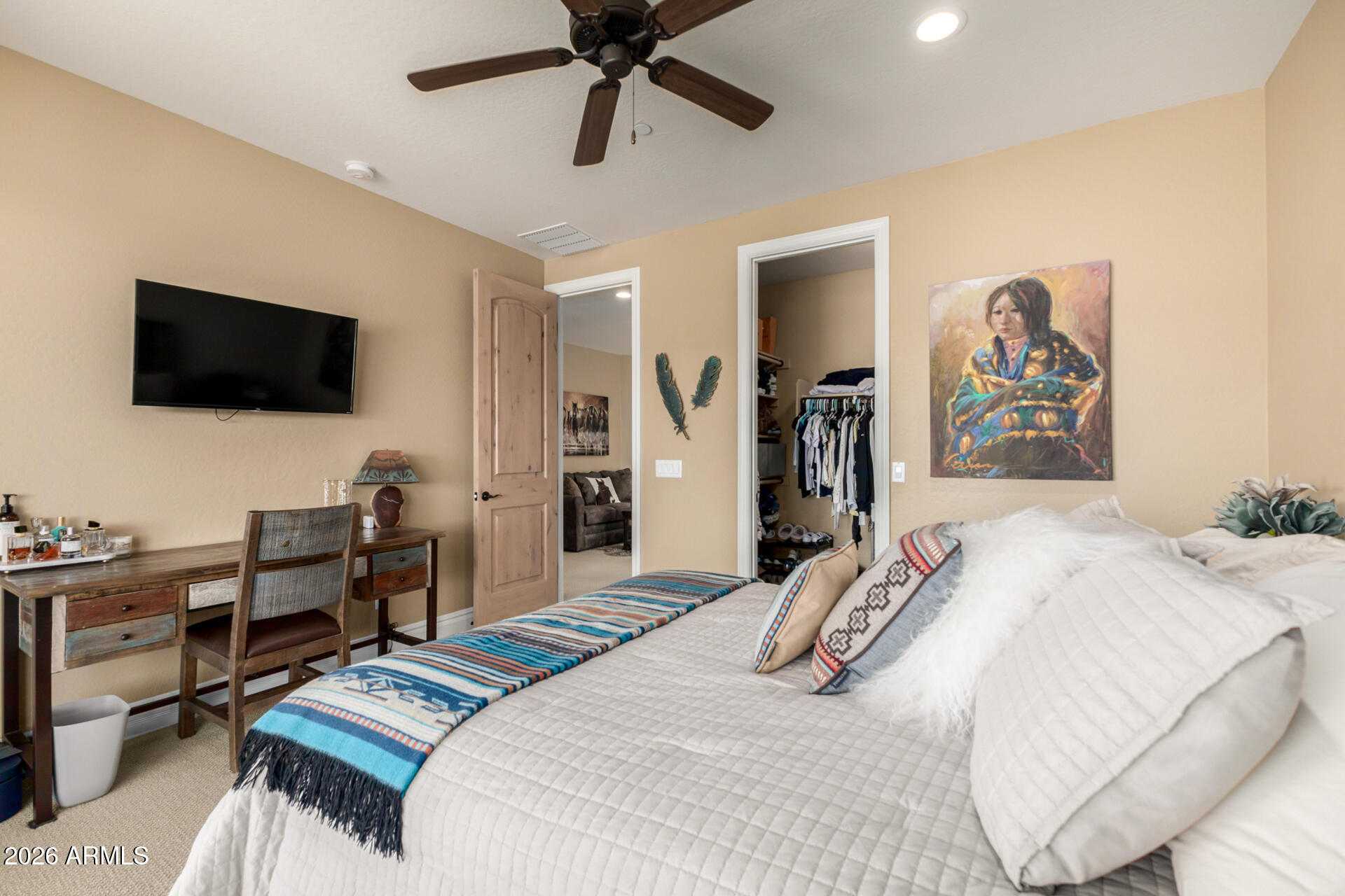 6434 East Military Road, Unit 102 Cave Creek, AZ 85331 - Photo 25 of 66 a bedroom with a bed and a flat screen tv