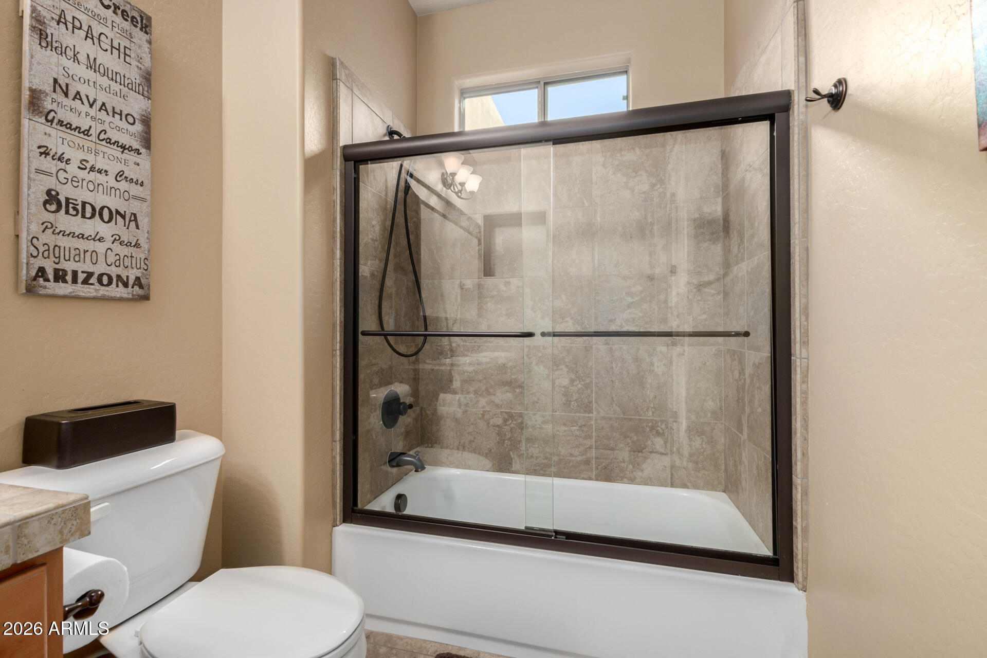 6434 East Military Road, Unit 102 Cave Creek, AZ 85331 - Photo 27 of 66 a bathroom with a shower and a toilet