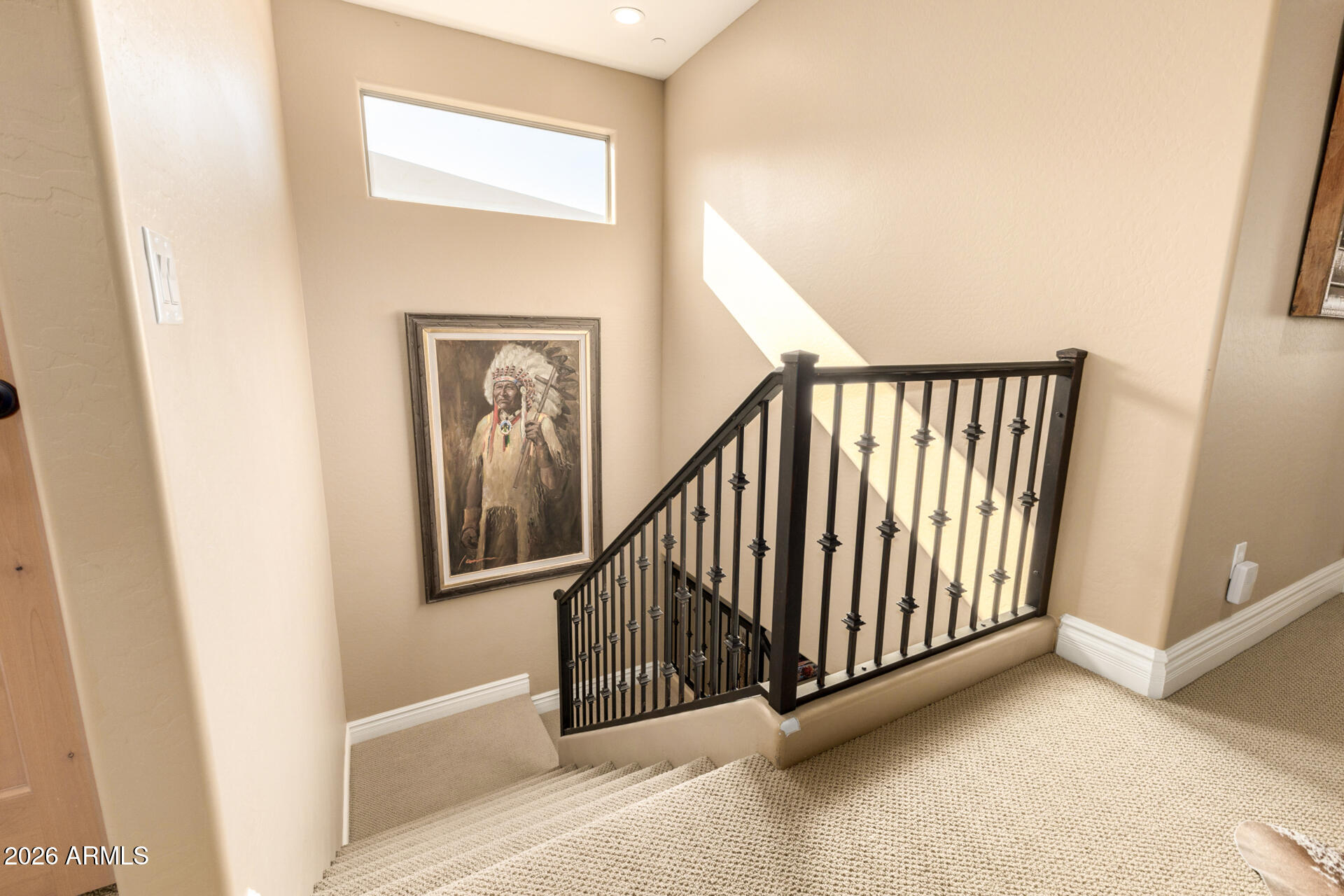 6434 East Military Road, Unit 102 Cave Creek, AZ 85331 - Photo 28 of 66 a view of a hallway with staircase