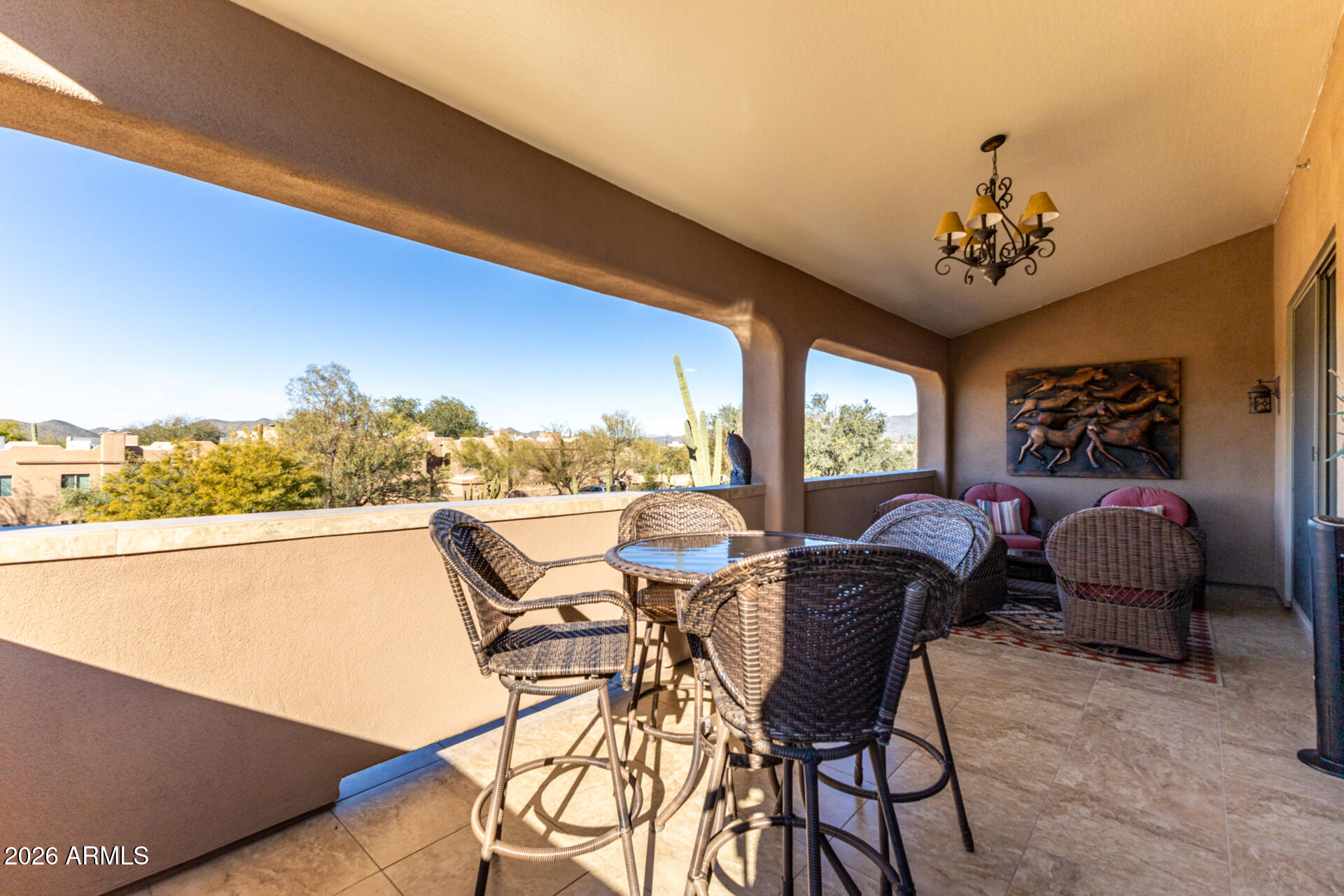 6434 East Military Road, Unit 102 Cave Creek, AZ 85331 - Photo 36 of 66 a view of a dining room with furniture window and outside view