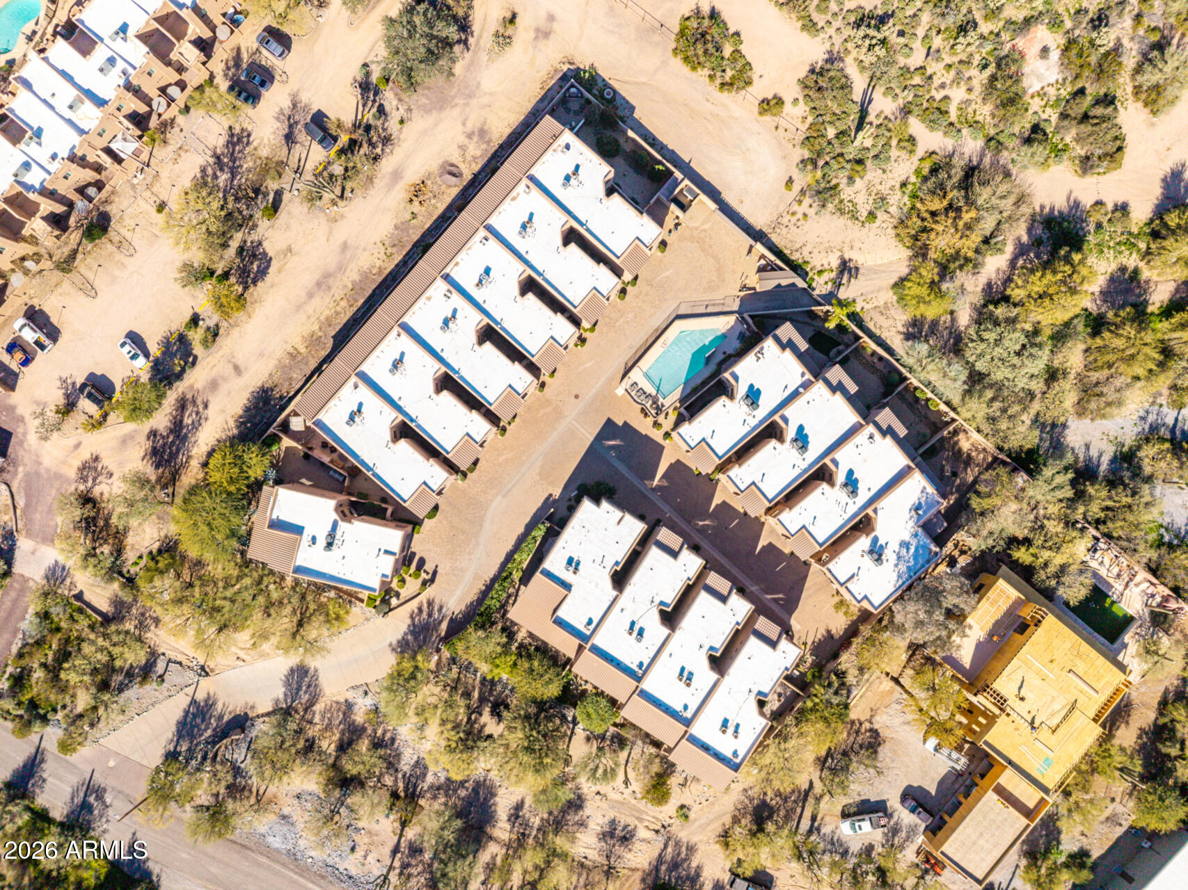 6434 East Military Road, Unit 102 Cave Creek, AZ 85331 - Photo 54 of 66 a view of a house with a street