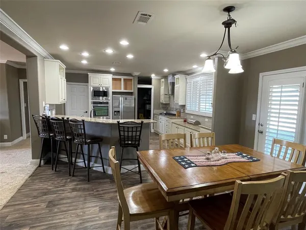 a view of a lake with a yard