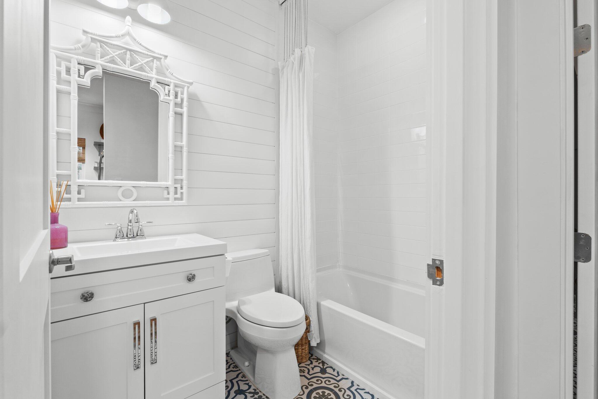 58 Cottage Way, Unit 6 Inlet Beach, FL 32461 - Photo 12 of 60 a bathroom with a sink a toilet and shower