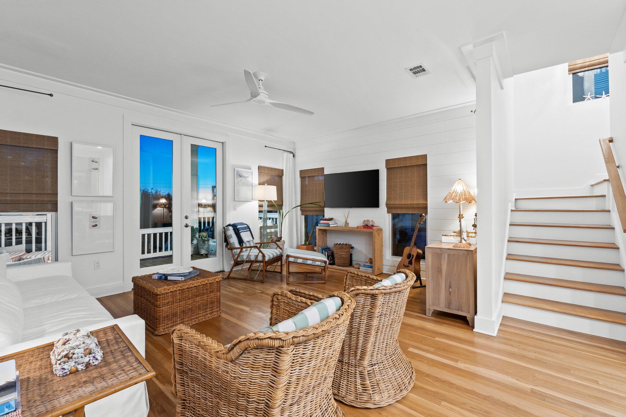 58 Cottage Way, Unit 6 Inlet Beach, FL 32461 - Photo 21 of 60 a living room with furniture a flat screen tv and kitchen view