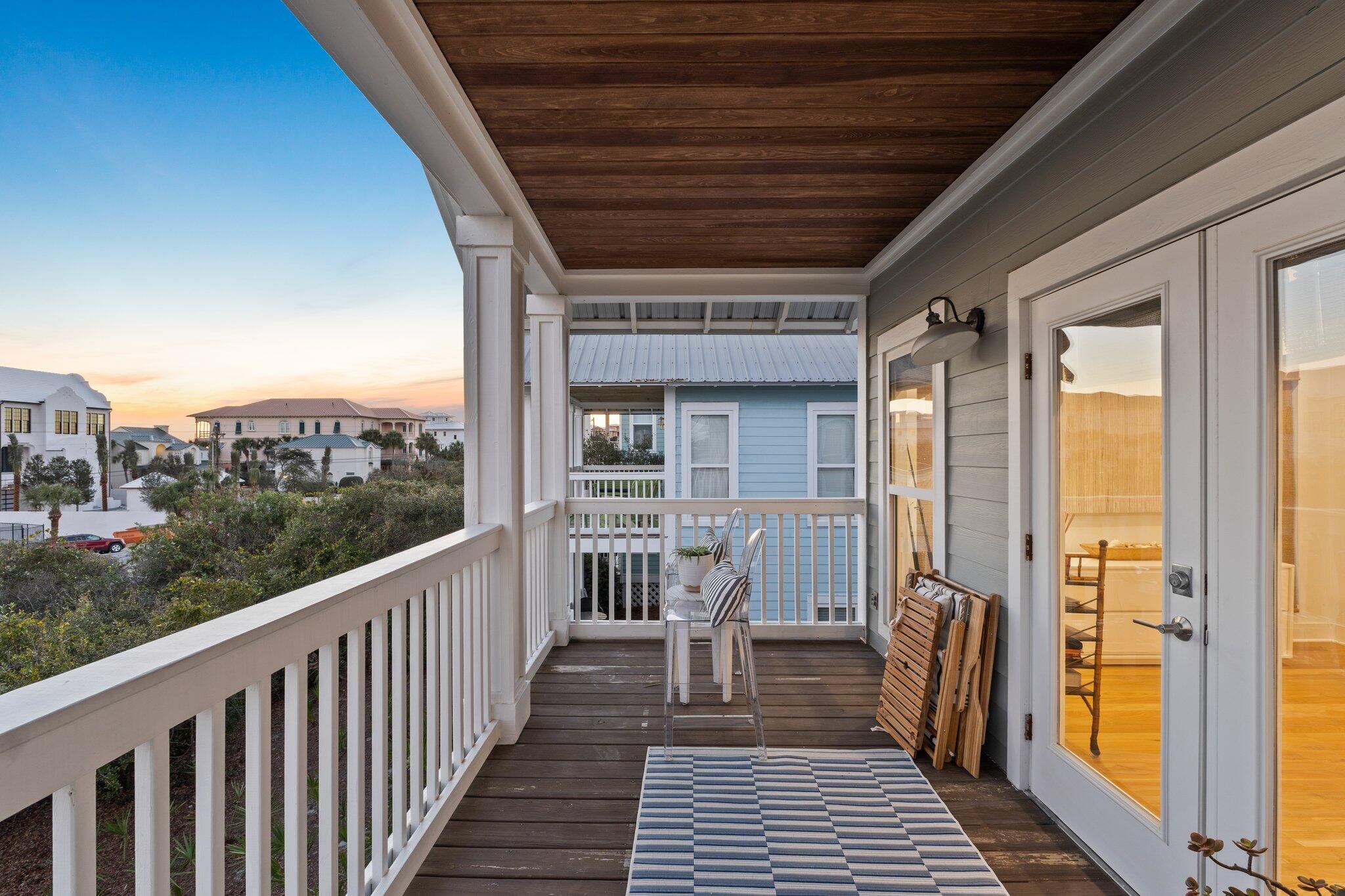 58 Cottage Way, Unit 6 Inlet Beach, FL 32461 - Photo 34 of 60 a view of a balcony with wooden floor