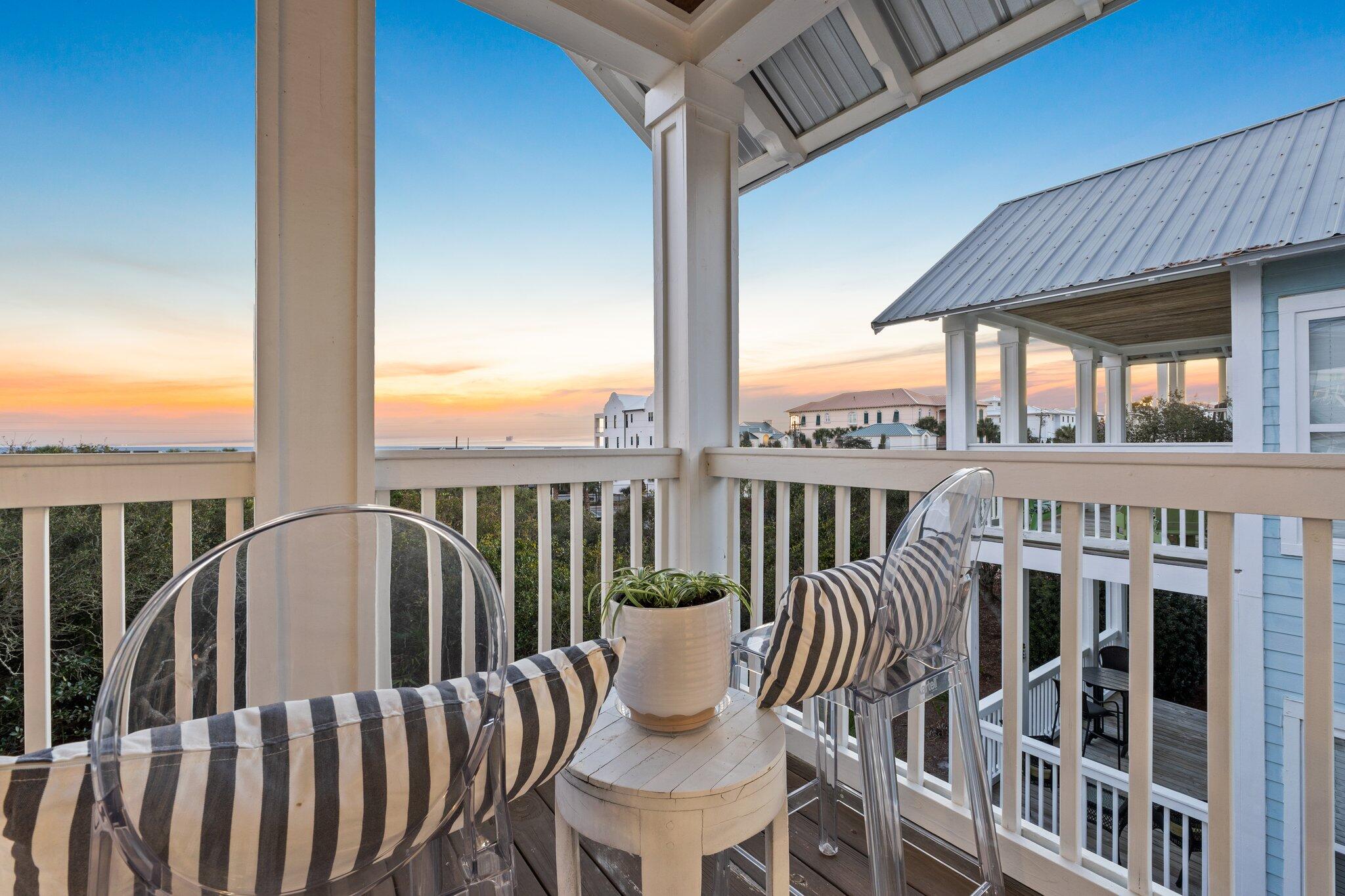 58 Cottage Way, Unit 6 Inlet Beach, FL 32461 - Photo 36 of 60 a view of a balcony with table and chairs