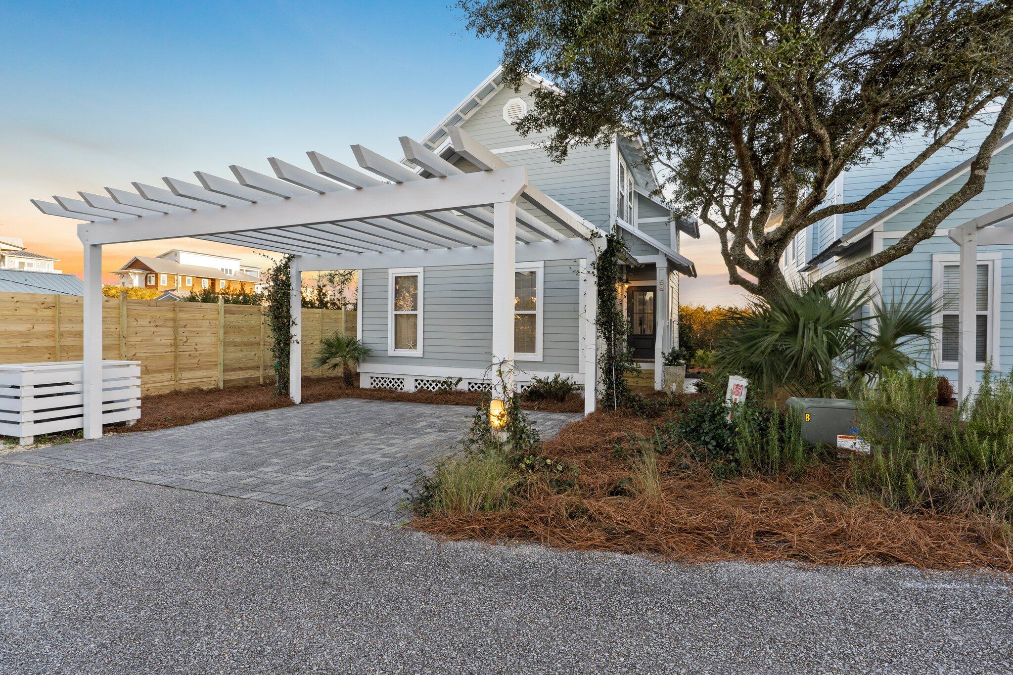 58 Cottage Way, Unit 6 Inlet Beach, FL 32461 - Photo 47 of 60 a view of a house with a backyard and sitting area