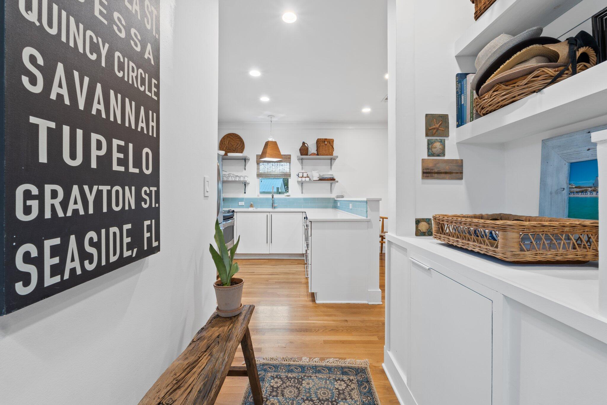 58 Cottage Way, Unit 6 Inlet Beach, FL 32461 - Photo 5 of 60 a kitchen with stainless steel appliances granite countertop a stove a sink and a refrigerator