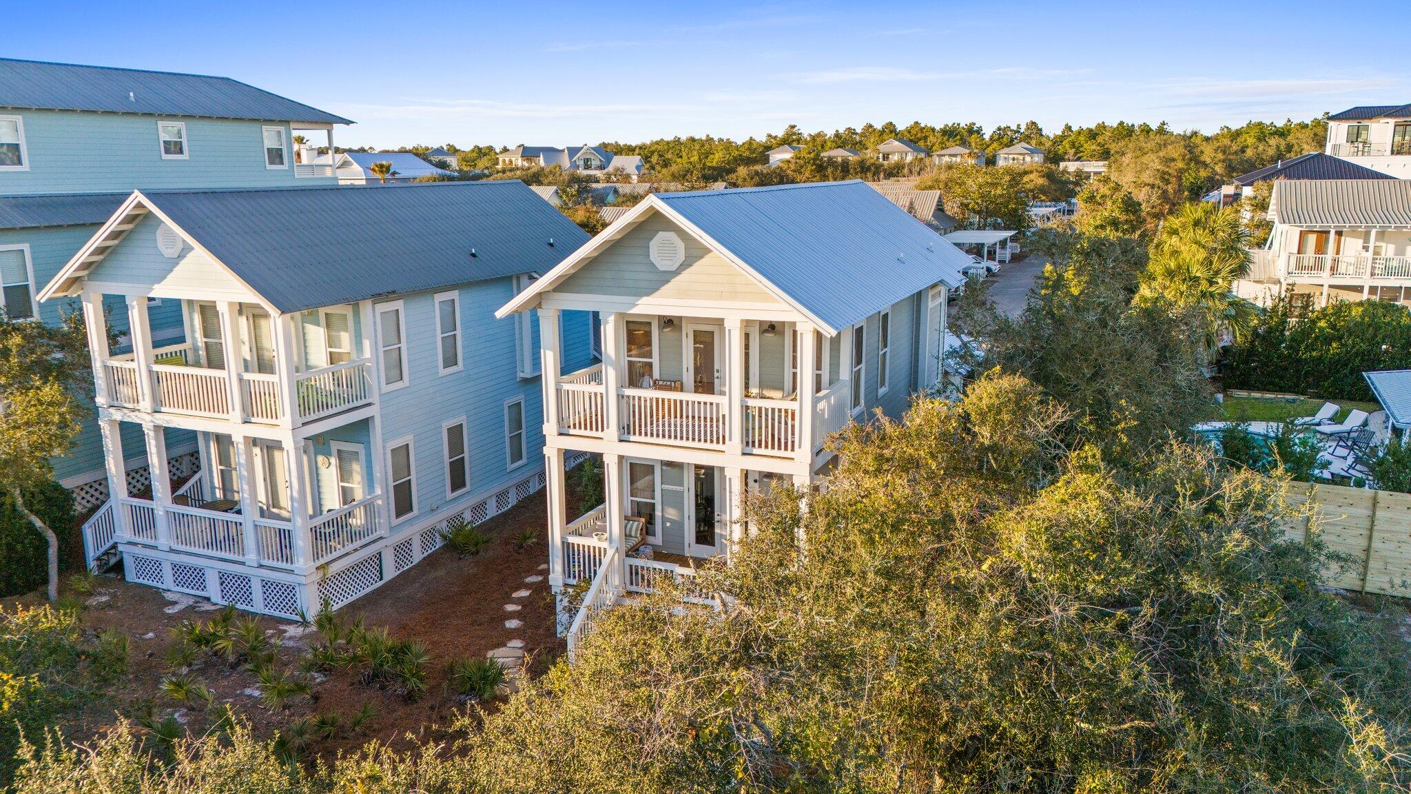 58 Cottage Way, Unit 6 Inlet Beach, FL 32461 - Photo 54 of 60 a view of a big house with a big yard and large trees