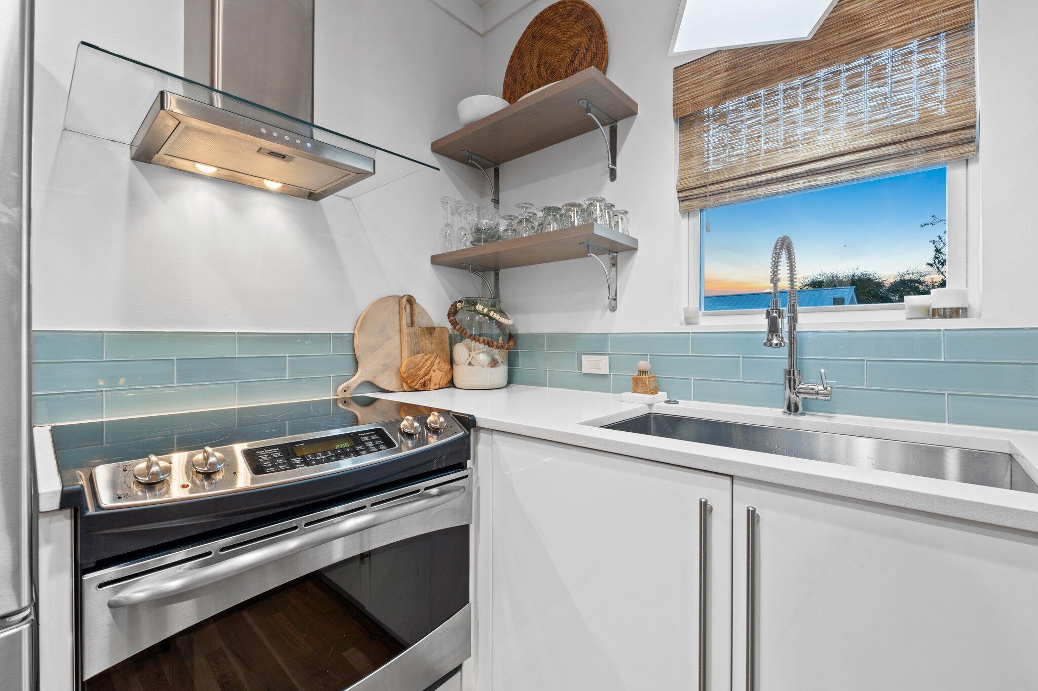 58 Cottage Way, Unit 6 Inlet Beach, FL 32461 - Photo 10 of 60 a kitchen with a stove and a sink