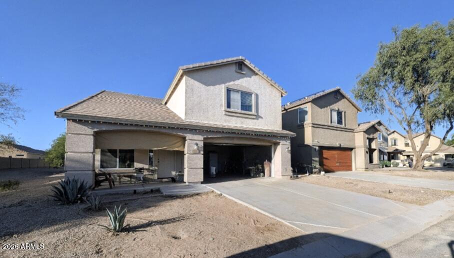 a view of a house with a patio
