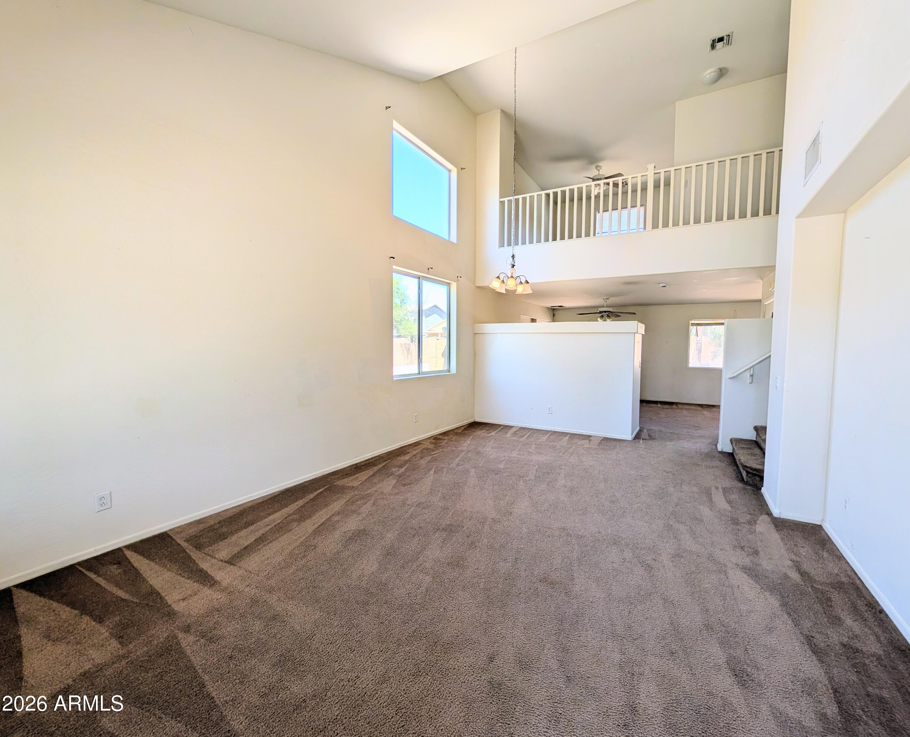 712 Baldwin Loop Coolidge, AZ 85128 - Photo 21 of 21 a view of an empty room with a window