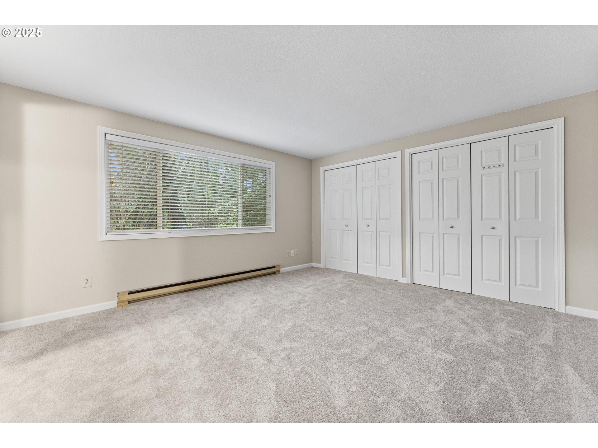 7112 Southwest Murray Boulevard Beaverton, OR 97008 - Photo 23 of 40 a view of an empty room with a window