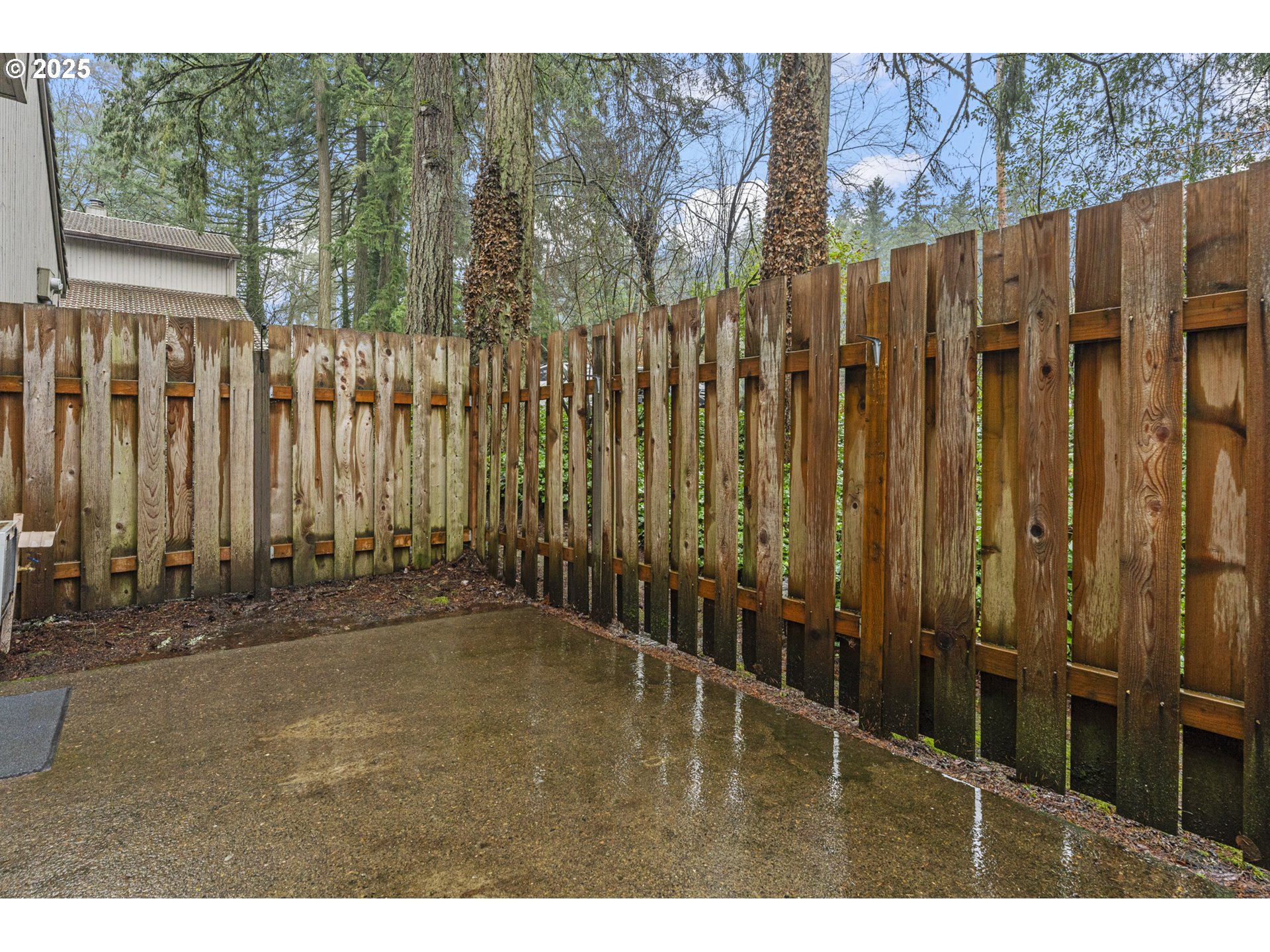 7112 Southwest Murray Boulevard Beaverton, OR 97008 - Photo 37 of 40 a view of outdoor space with wooden fence