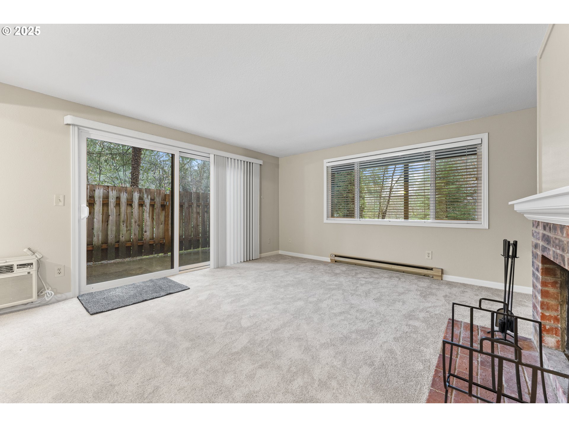 7112 Southwest Murray Boulevard Beaverton, OR 97008 - Photo 8 of 40 a view of an empty room with glass door