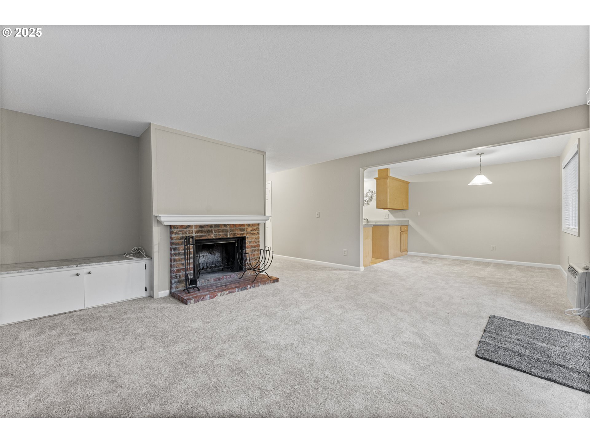 7112 Southwest Murray Boulevard Beaverton, OR 97008 - Photo 9 of 40 a view of an empty room with a fireplace