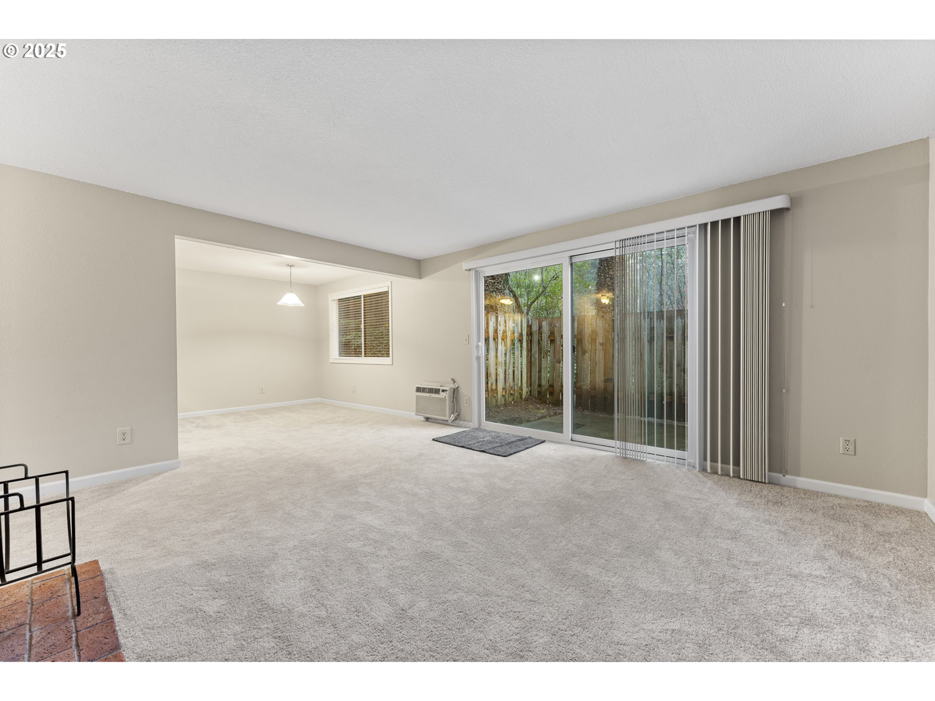 7112 Southwest Murray Boulevard Beaverton, OR 97008 - Photo 10 of 40 a view of an empty room with glass door