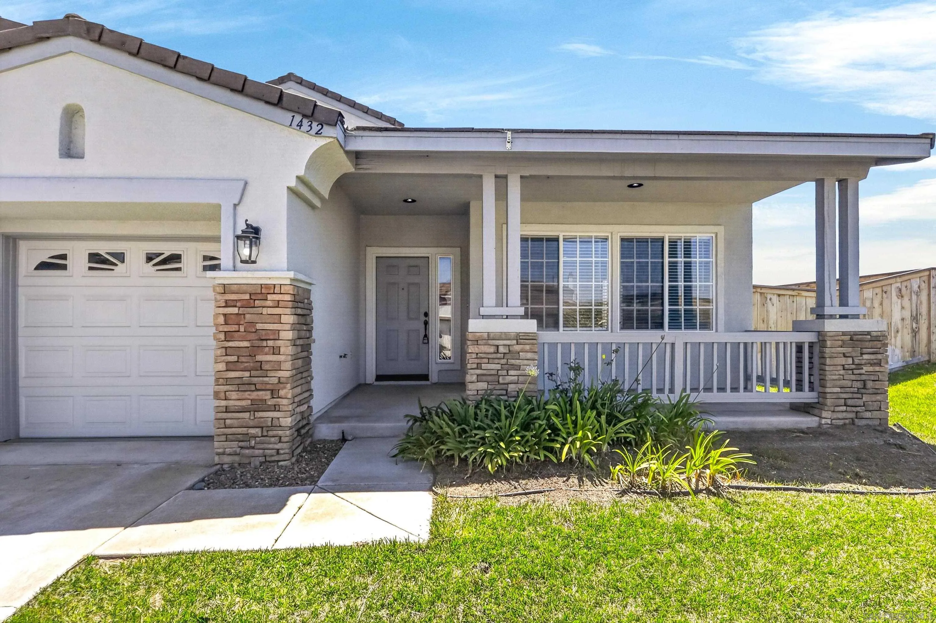 1432 Belmont Park Road Oceanside, CA 92057 - Photo 5 of 54 a view of front door of house with outdoor seating