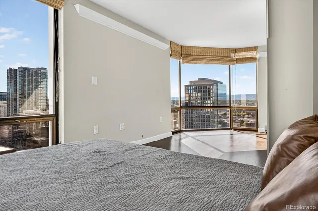 a view of a living room with a large window