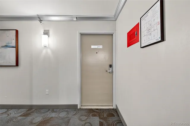 a view of hallway with walk in closet