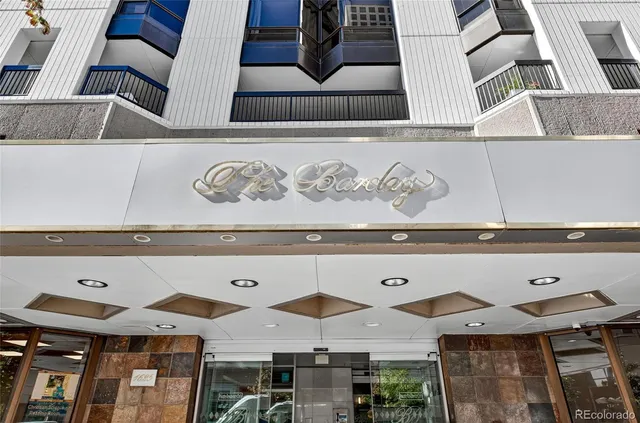 a front view of a building with balcony