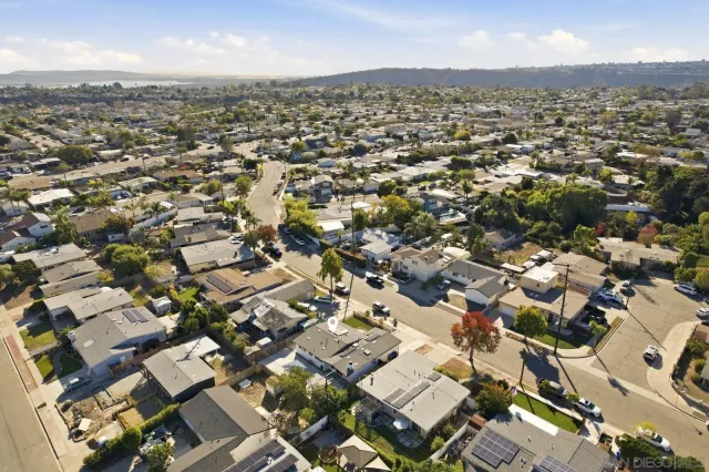 an aerial view of a city with lots of residential buildings