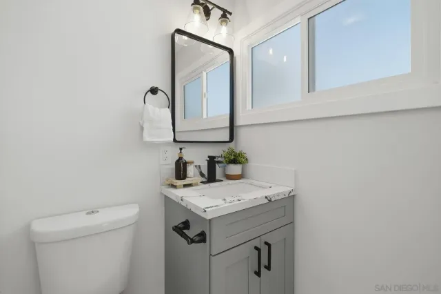 a bathroom with a sink and a toilet