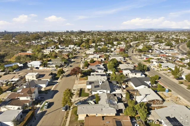 an aerial view of residential building and street