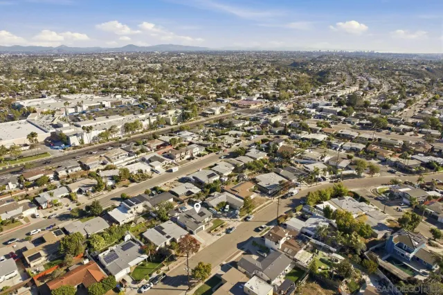 an aerial view of residential building with parking space