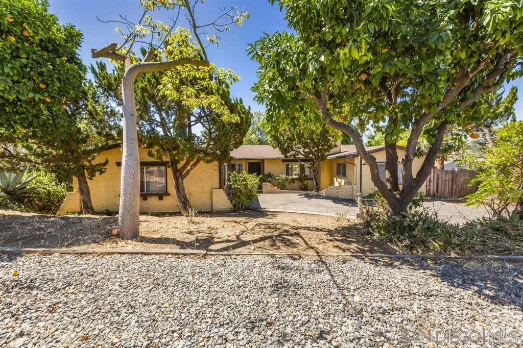 229 Shetland Way Fallbrook, CA 92028 - Photo 3 of 22 a house with trees in front of it