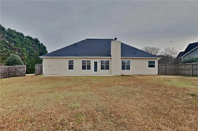 a house view with a garden space