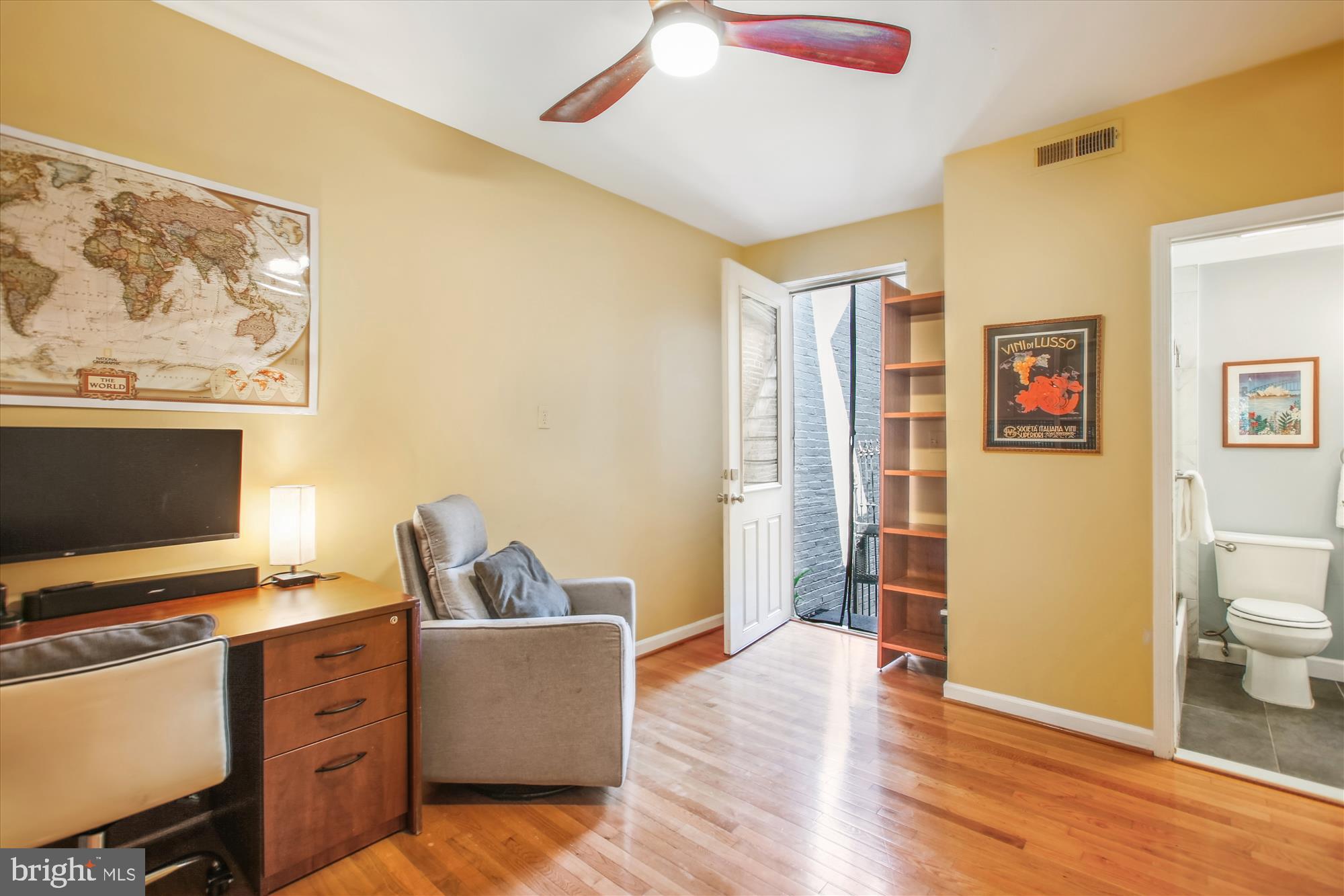 1725 Willard Street Northwest, Unit 3 Washington, DC 20009 - Photo 22 of 32 a living room with furniture and a flat screen tv