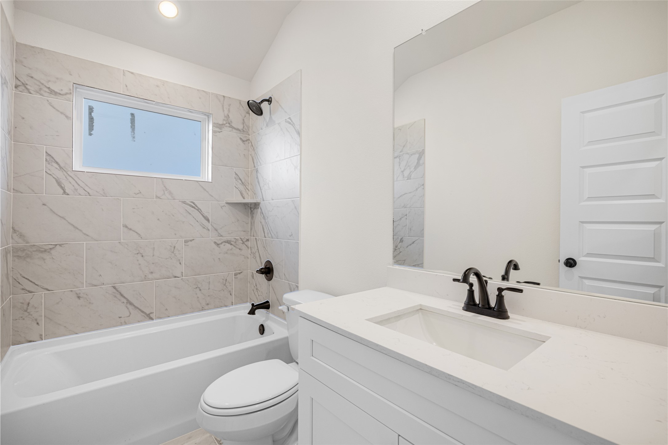 3222 Emerald Hills Drive Angleton, TX 77515 - Photo 23 of 31 a bathroom with a sink a toilet and a bathtub