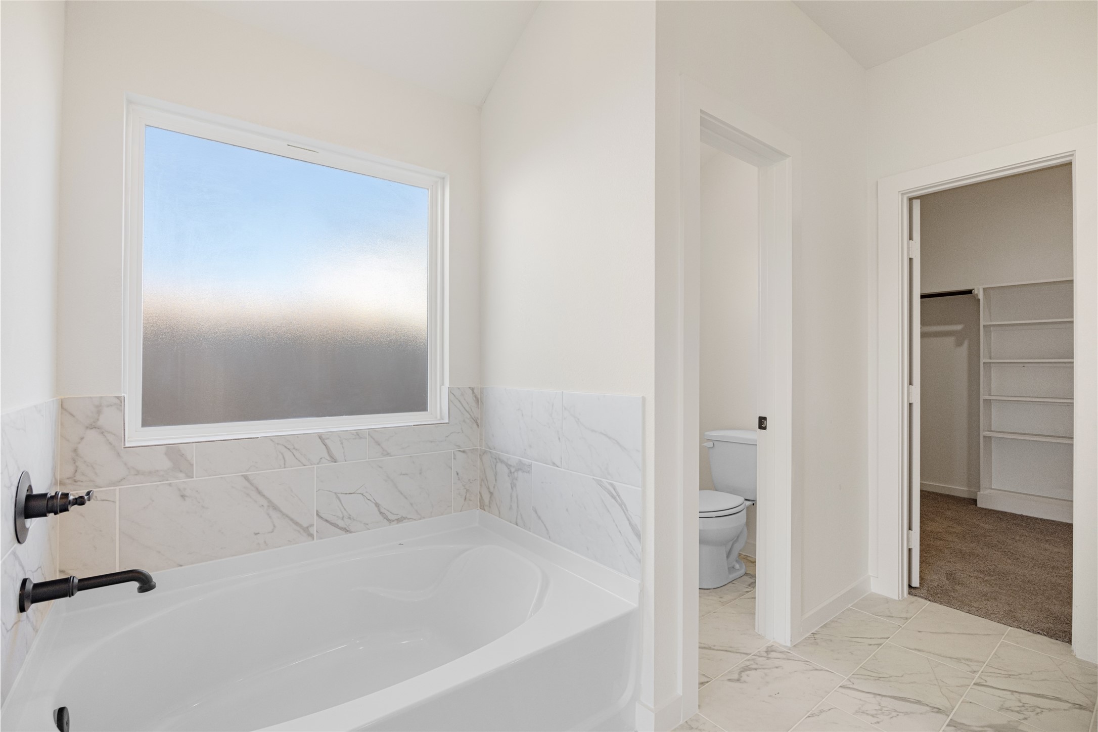 3222 Emerald Hills Drive Angleton, TX 77515 - Photo 24 of 31 a bathroom with a bathtub and a shower